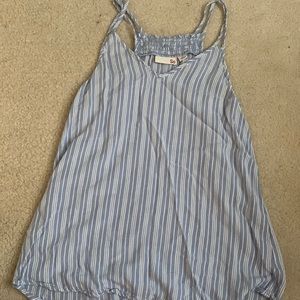 I got this spaghetti string top from Kohl’s. It is so cute and has white stripes